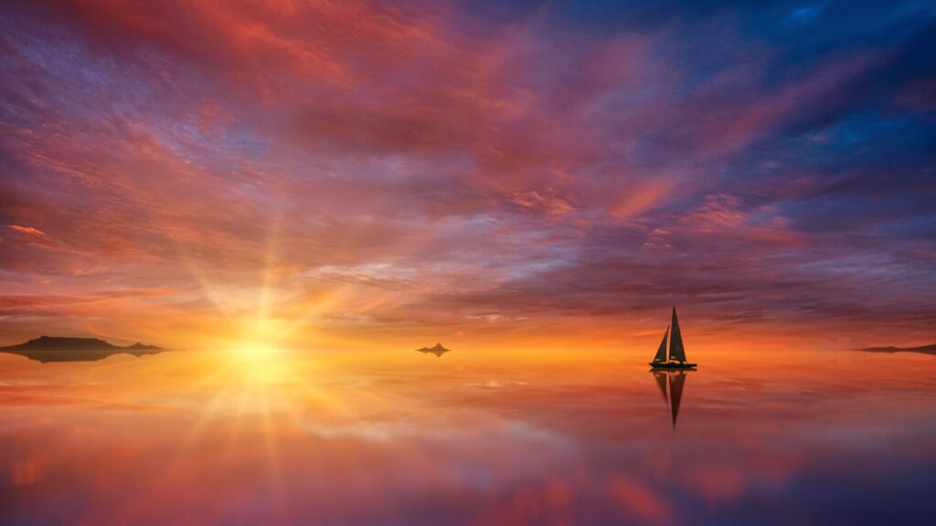 voilier coucher de soleil autre rive